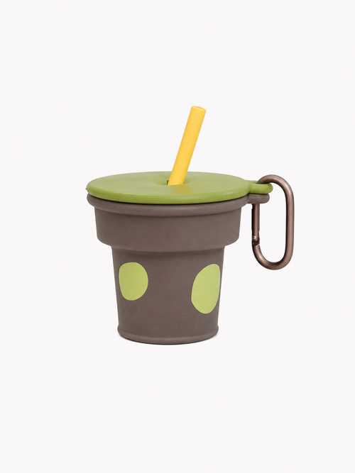 Mint and brown collapsible silicone travel cup with straw and metal carabiner